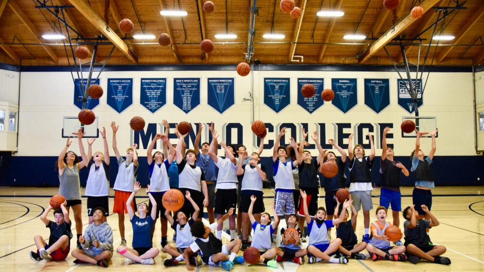 Basketball group photo on the court.