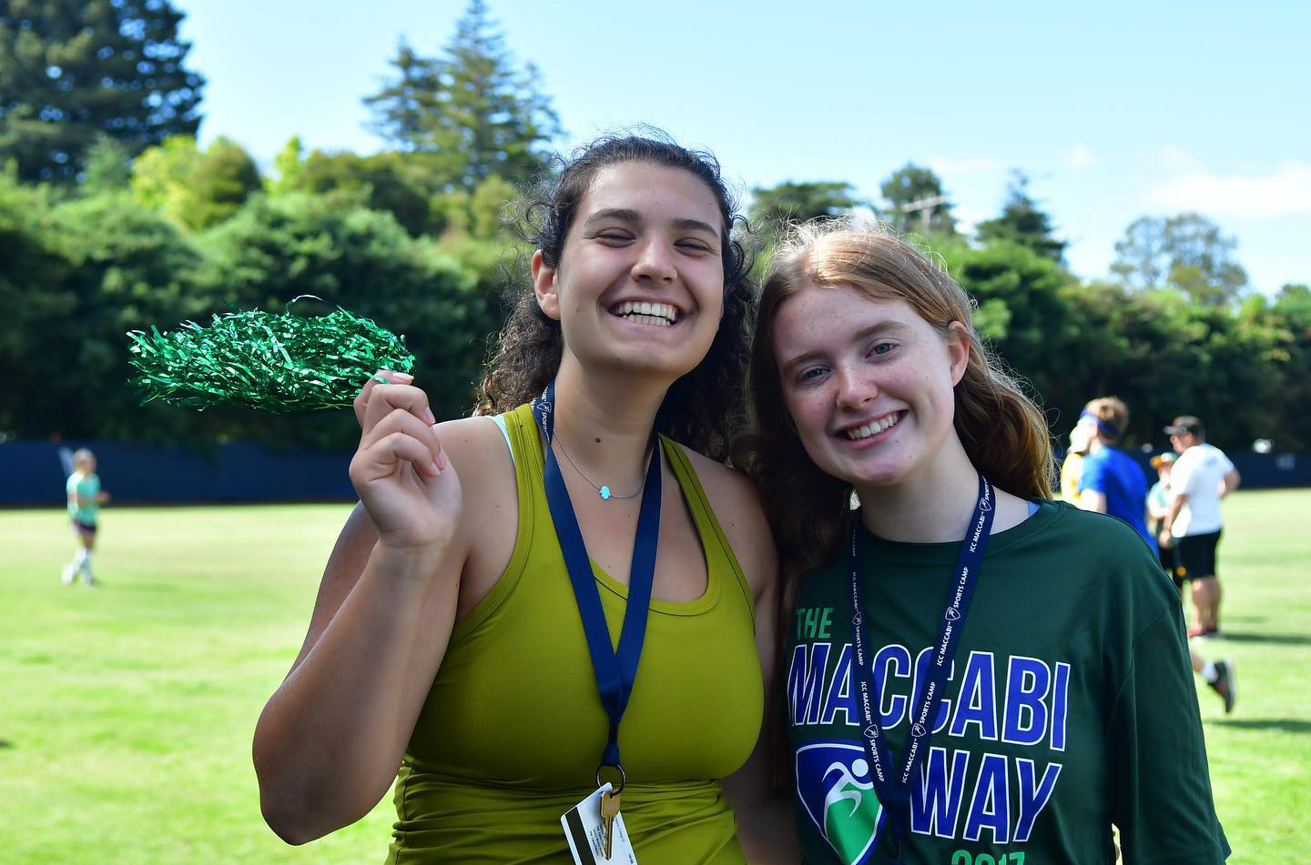 Two junior counselors smiling.