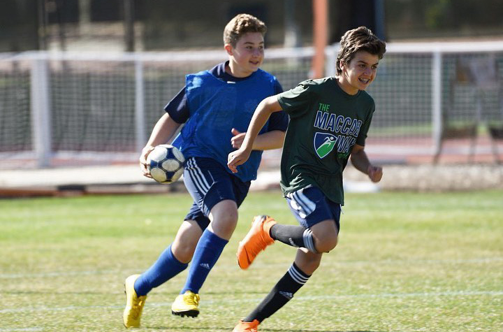 Campers playing soccer.