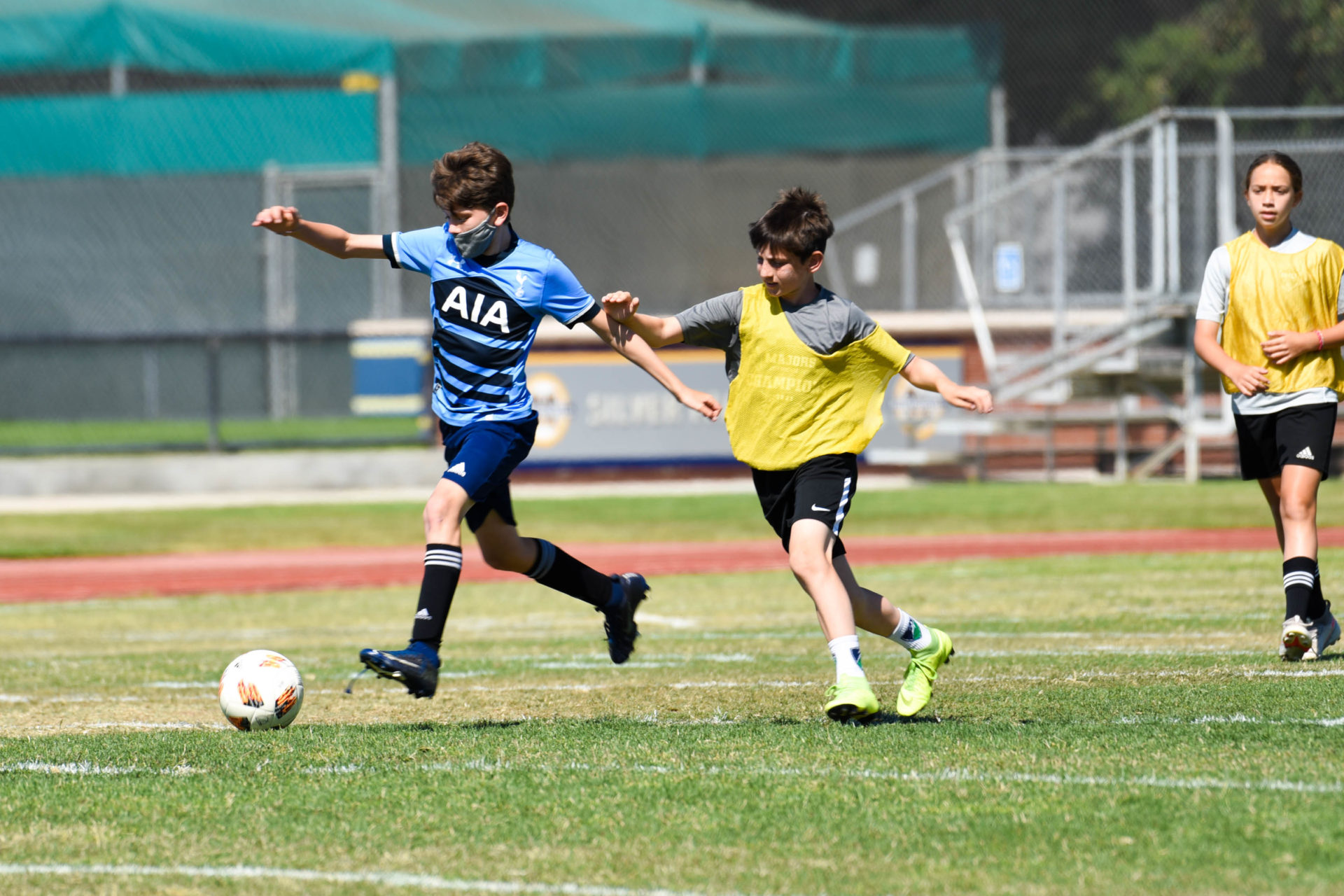 Boys playing soccer.