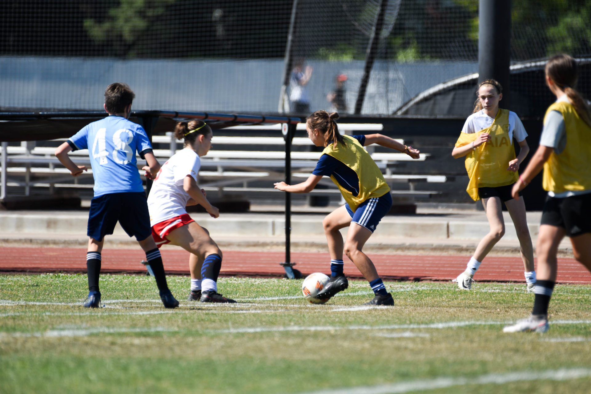 Campers playing a soccer game.