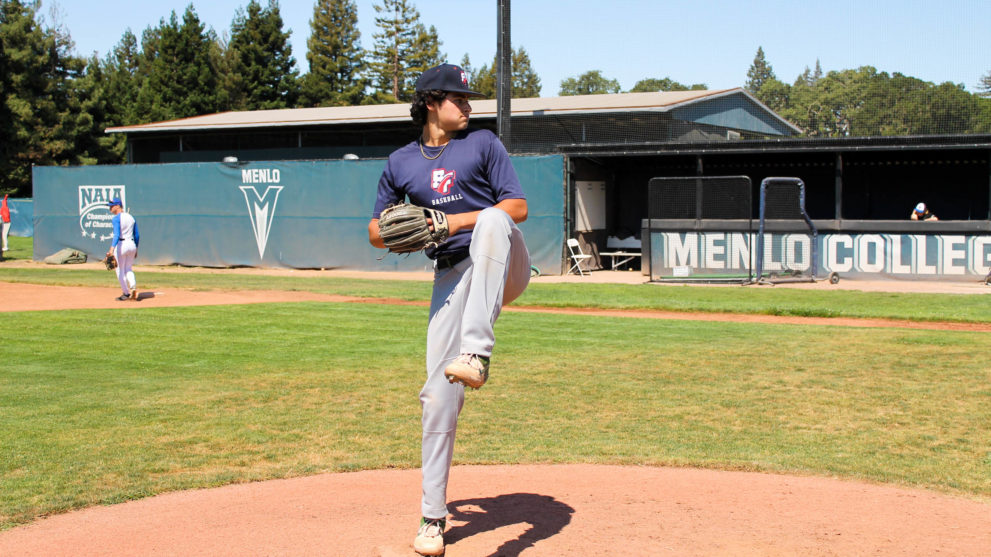 Camper pitching on the baseball mound.
